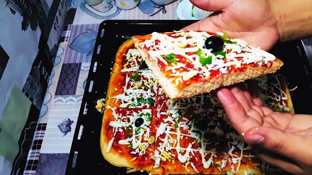 وصفة بيتزا الكاري الجزائرية التي تباع عند البيتزيريا