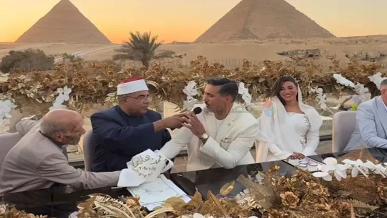 7 صور ترصد كتب كتاب الإعلامي محمد غنيم والفنانة هايدي موسى