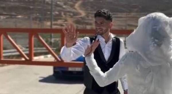 بوابة إسرائيلية تحول بين عروسين يوم زفافهما برام الله