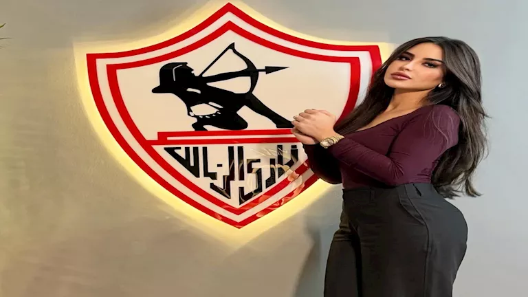 زوجة محمد عواد تنشر 14 صورة جديدة أمام شعار الزمالك